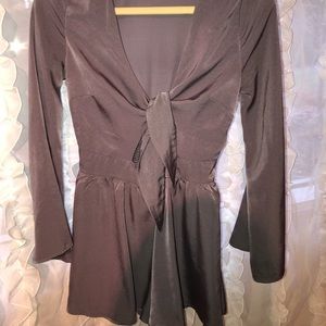 Silver romper ties in front